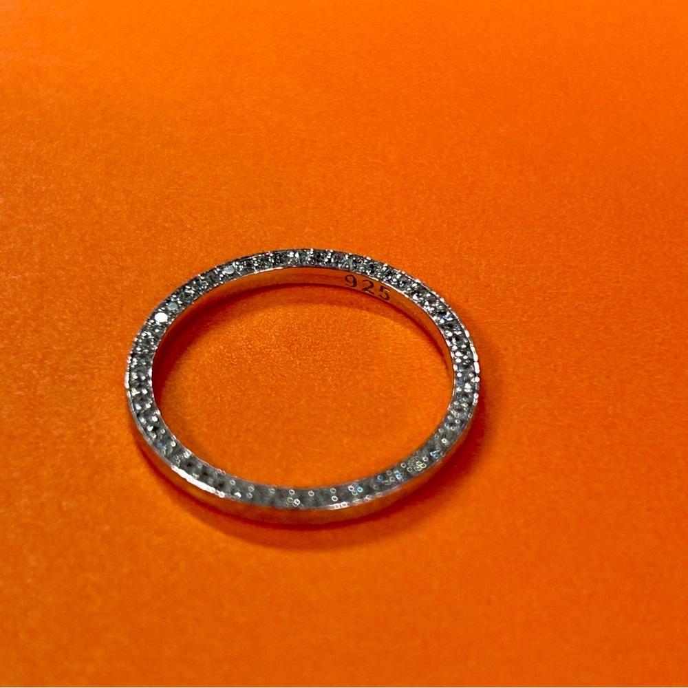 1.70 mm two sided micro pavè moissanite diamond eternity band.